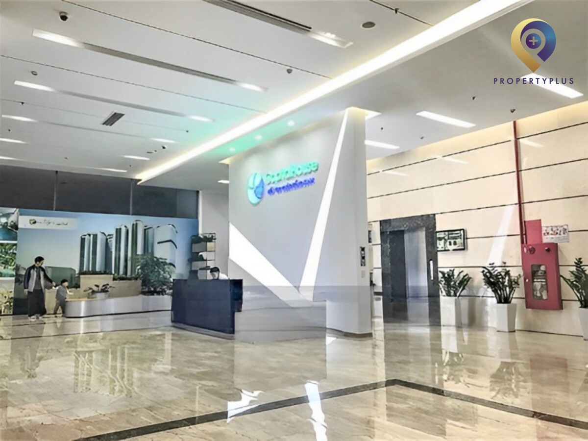 Reception desk at Ecolife Capitol with clean and modern interior